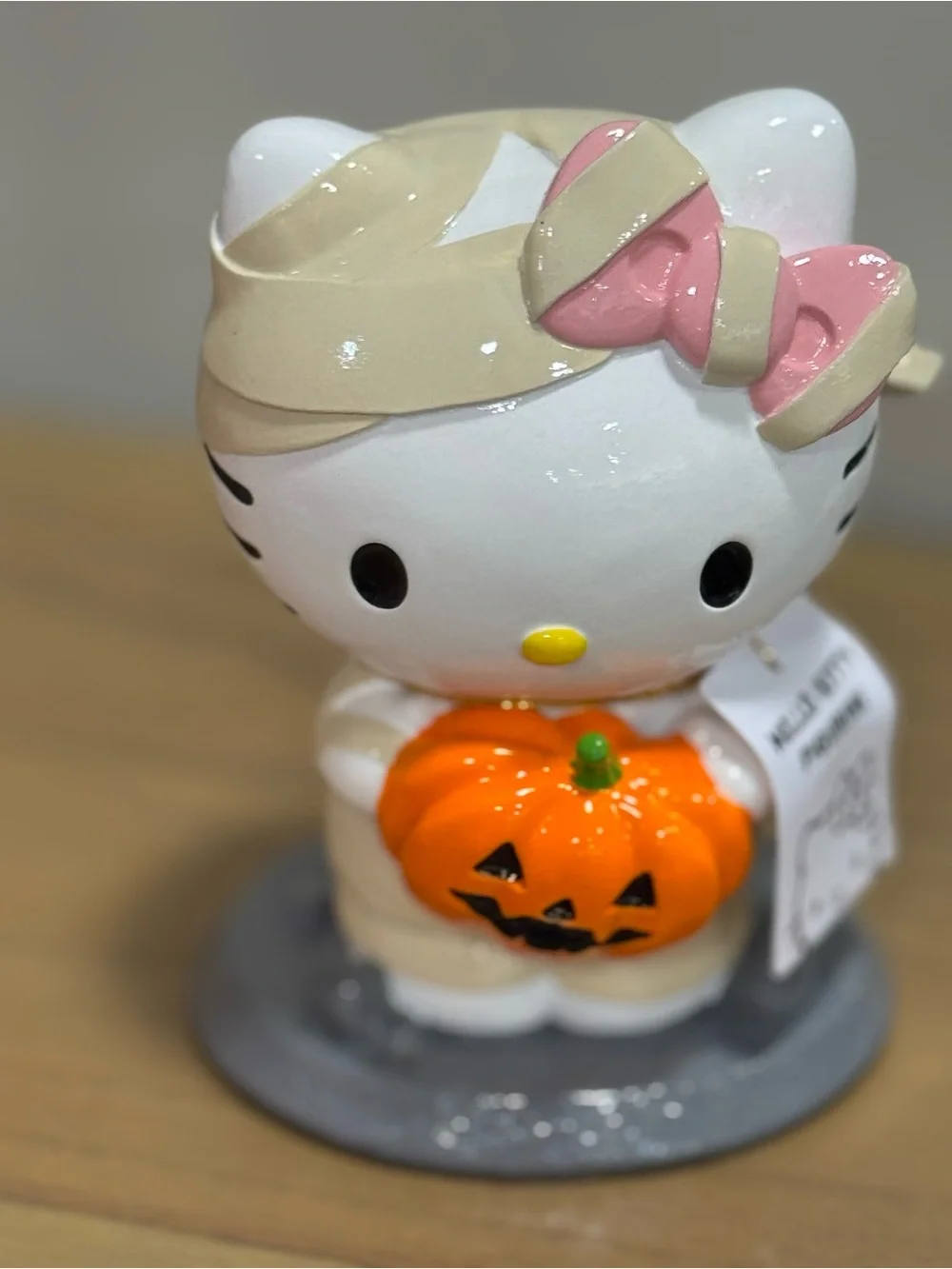 Hello Kitty mummy Figurine with Orange Pumpkin and Pink Bow